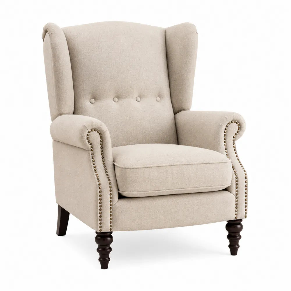 Sillón orejero de lino beige con patas de madera de nogal